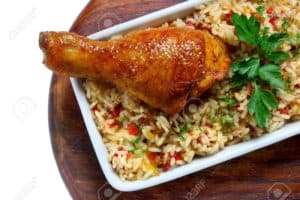 Amaka preparing authentic African dishes